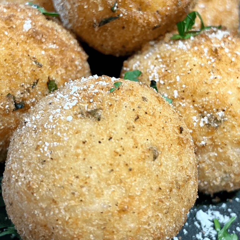 Savor Our Arancini Today